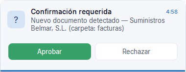 Aviso de aprobación de Polaris AI en el escritorio: «Confirmación requerida · Nuevo documento detectado — Suministros Belmar, S.L. (carpeta: facturas)», con los botones Aprobar y Rechazar.
